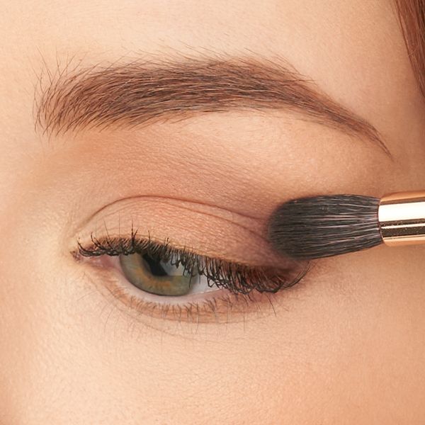 Applying eyeshadow